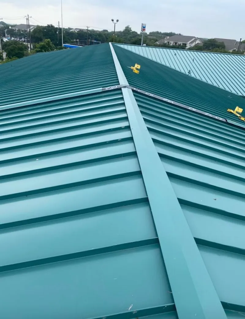 Green commercial metal roof ridge and valley for Metal Roof Repair in Blythewood